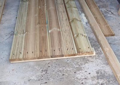 Decking boards cut and prepared for the planter
